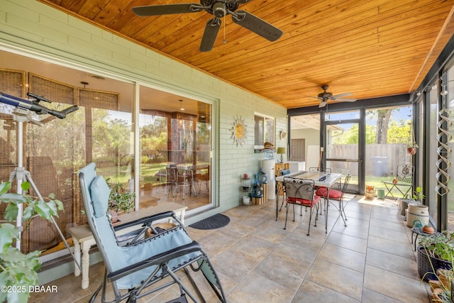200 W Washington Ave, Deland, FL 32720 - sunroom / solarium with a ceiling fan and outdoor dining space