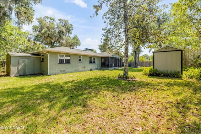 200 W Washington Ave, Deland, FL 32720 - back of house with a sunroom, crawl space, and brick siding