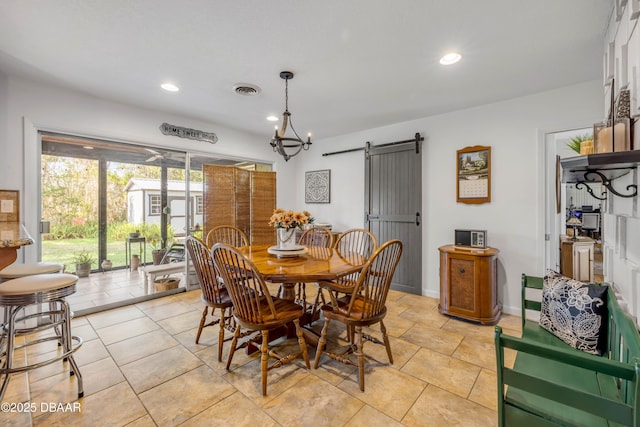 200 W Washington Ave, Deland, FL 32720 - dining area with a barn door and recessed lighting