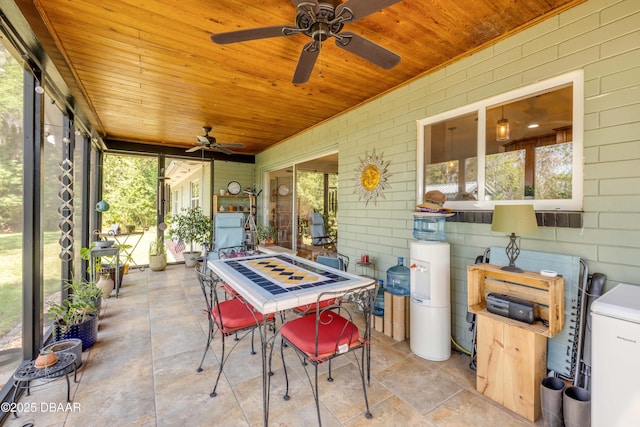 200 W Washington Ave, Deland, FL 32720 - sunroom with ceiling fan, outdoor dining area, and healthy amount of natural light