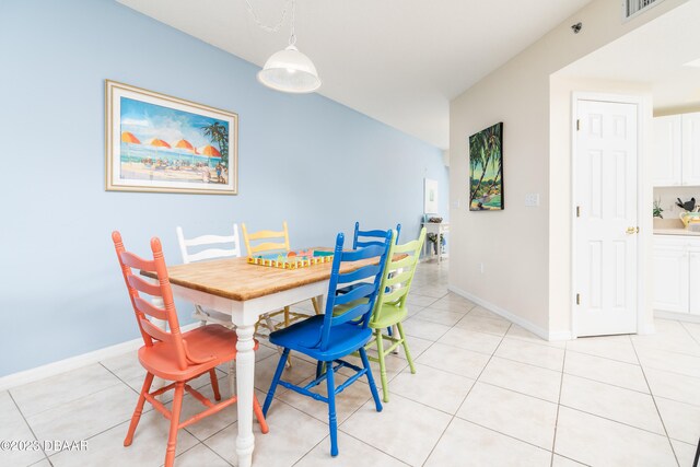 dining room featuring light tile patterned floors