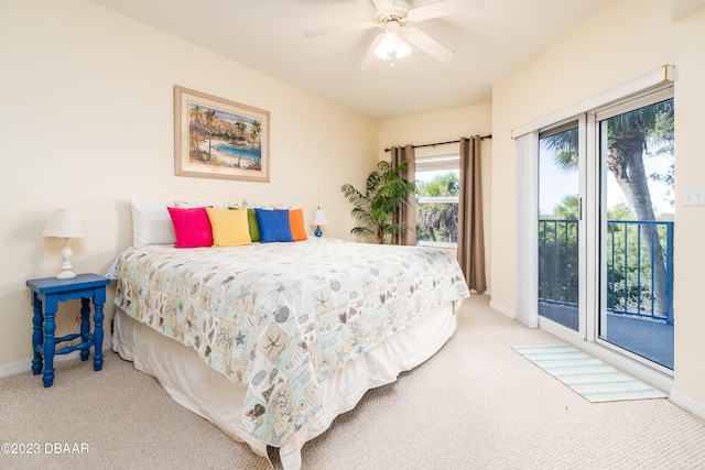 carpeted bedroom featuring ceiling fan and access to outside