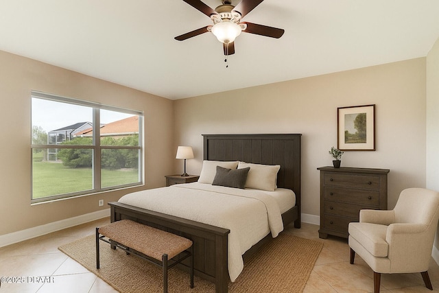 1832 Afshin Ct, Port Orange, FL 32128 - bedroom with light tile patterned floors and ceiling fan