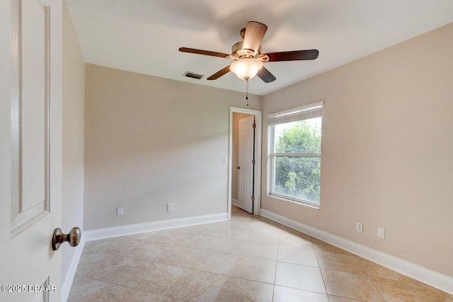 1832 Afshin Ct, Port Orange, FL 32128 - unfurnished room with a ceiling fan and light tile patterned floors