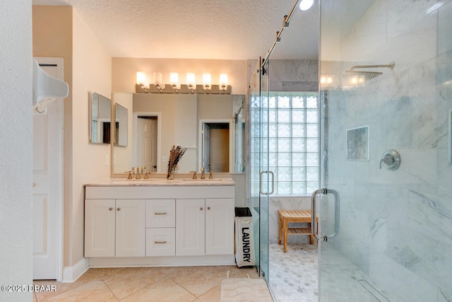1832 Afshin Ct, Port Orange, FL 32128 - full bathroom featuring a stall shower, double vanity, a textured ceiling, and tile patterned floors