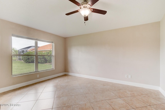 1832 Afshin Ct, Port Orange, FL 32128 - spare room featuring ceiling fan and light tile patterned floors