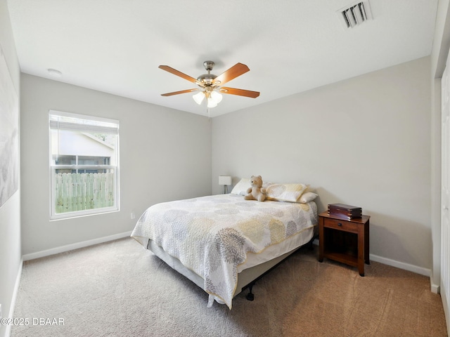 1354 Vandalia Ave SE, Palm Bay, FL 32909 - bedroom with baseboards, carpet floors, and ceiling fan