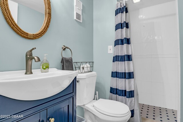 3800 S S Atlantic Ave Unit 105, Daytona Beach Shores, FL 32118 - full bath featuring toilet, tiled shower, and vanity