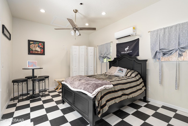 bedroom featuring tile patterned floors, baseboards, a wall mounted air conditioner, and recessed lighting