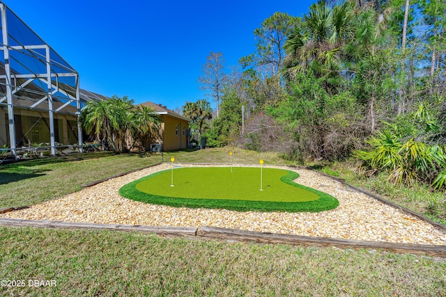 view of yard with a lanai