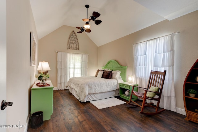 bedroom with a ceiling fan, vaulted ceiling, and wood finished floors