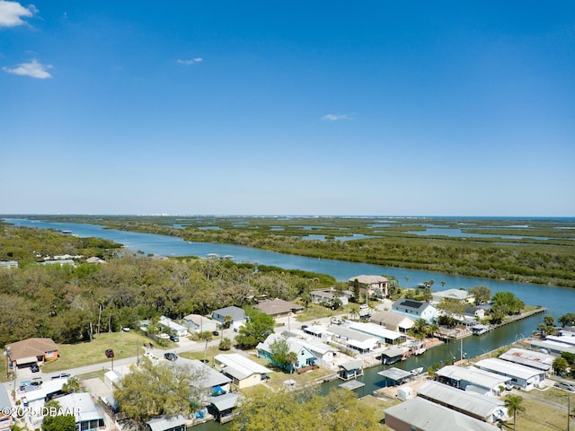 bird's eye view with a residential view and a water view