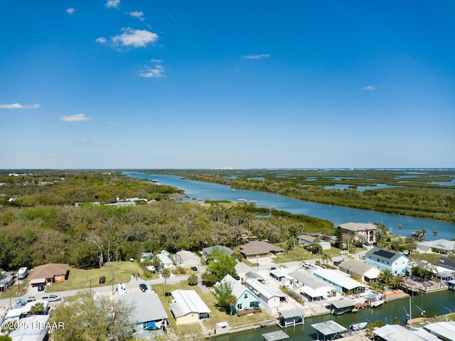 birds eye view of property featuring a residential view and a water view