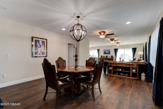 dining area with recessed lighting, baseboards, wood finished floors, and ceiling fan with notable chandelier