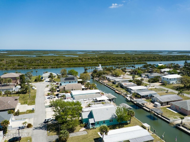 birds eye view of property with a residential view and a water view