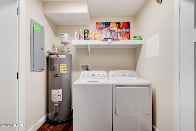 laundry room with baseboards, water heater, laundry area, electric panel, and washer and dryer