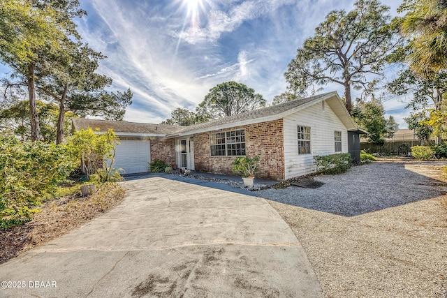 single story home with a garage