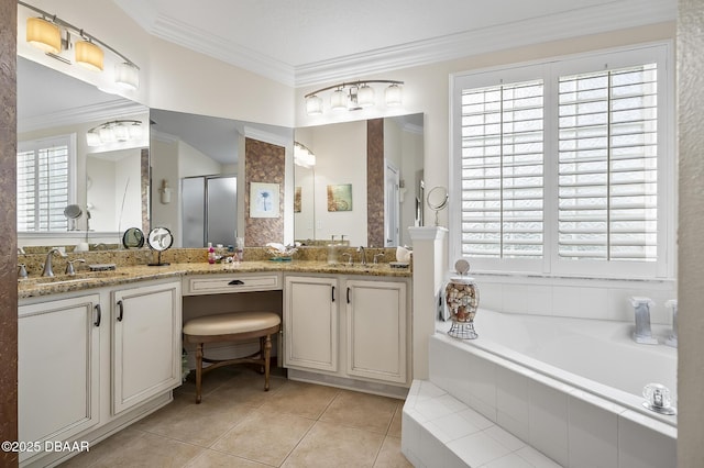 bathroom featuring tile patterned flooring, vanity, a wealth of natural light, and independent shower and bath