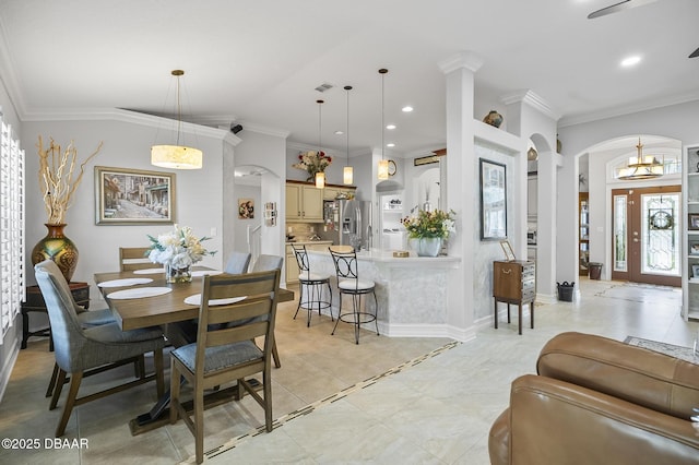 tiled dining room with ornamental molding