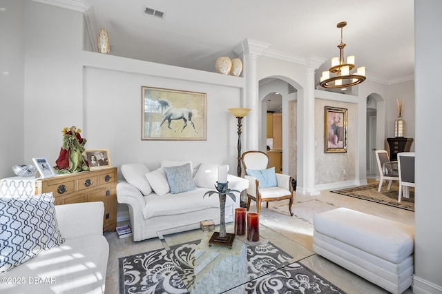 living room with crown molding and a notable chandelier