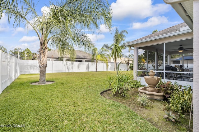 view of yard featuring a sunroom