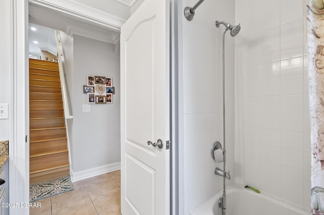 bathroom featuring tile patterned floors, vanity, shower / bathtub combination with curtain, and crown molding