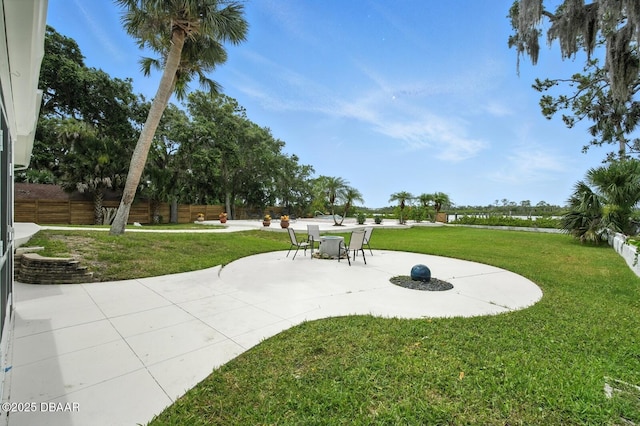 5540 W Bayshore Dr, Port Orange, FL 32127 - surrounding community with a patio