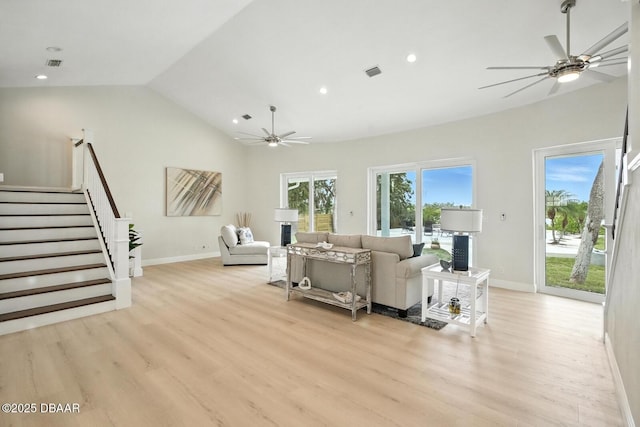 5540 W Bayshore Dr, Port Orange, FL 32127 - living area with ceiling fan, light wood-style floors, stairs, lofted ceiling, and recessed lighting