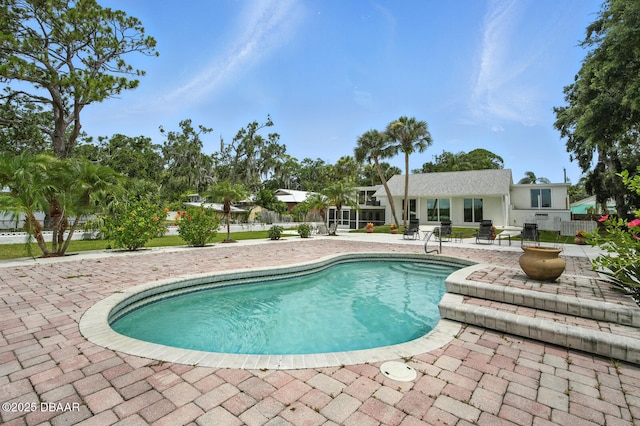 5540 W Bayshore Dr, Port Orange, FL 32127 - outdoor pool featuring a patio area