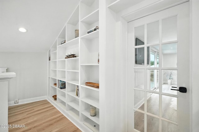 5540 W Bayshore Dr, Port Orange, FL 32127 - detailed view of baseboards and wood finished floors