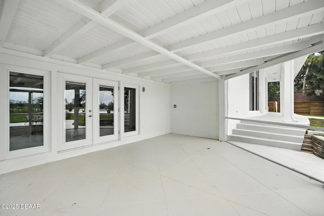 5540 W Bayshore Dr, Port Orange, FL 32127 - unfurnished sunroom featuring french doors and beamed ceiling