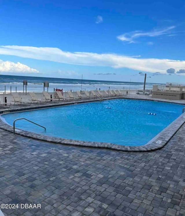 pool with a patio area