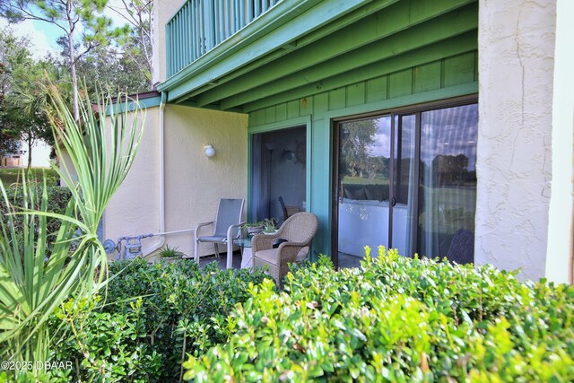 219 Club House Blvd Unit 219, New Smyrna Beach, FL 32168 - view of patio with a balcony
