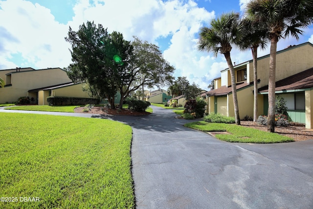 219 Club House Blvd Unit 219, New Smyrna Beach, FL 32168 - view of road with a residential view