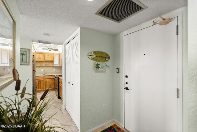 2987 S Atlantic Ave Unit Q020, Daytona Beach, FL 32118 - view of exterior entry featuring a sink