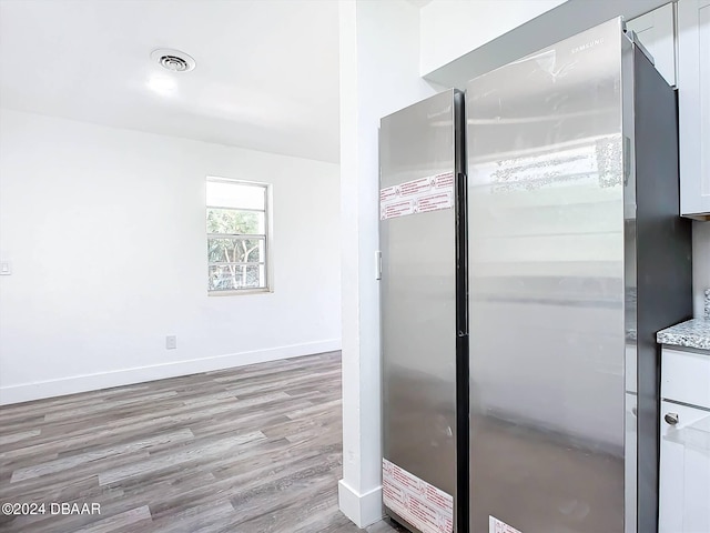 bathroom featuring wood-type flooring