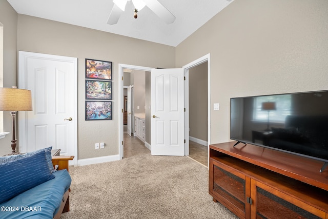 interior space with ceiling fan