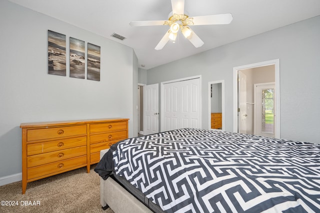 bedroom with ceiling fan, carpet flooring, and a closet