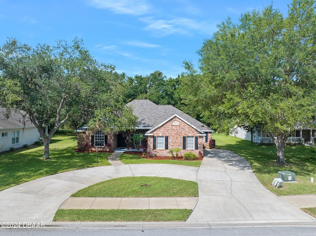 view of front of home with a front lawn