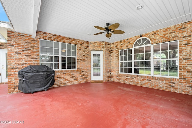 view of patio / terrace with area for grilling and ceiling fan