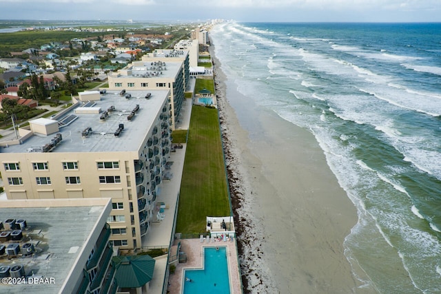 aerial view featuring a water view and a view of the beach