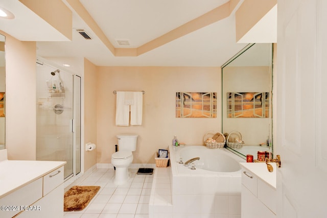 full bathroom with tile patterned flooring, vanity, separate shower and tub, and toilet