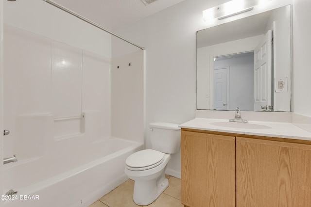 full bathroom with toilet, vanity, tile patterned flooring, and  shower combination