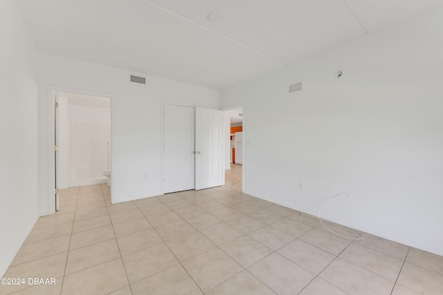 view of tiled spare room