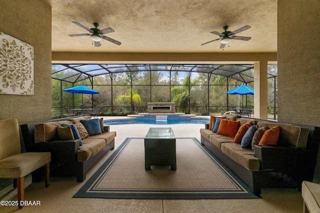 view of patio / terrace featuring an in ground hot tub, outdoor lounge area, ceiling fan, and glass enclosure