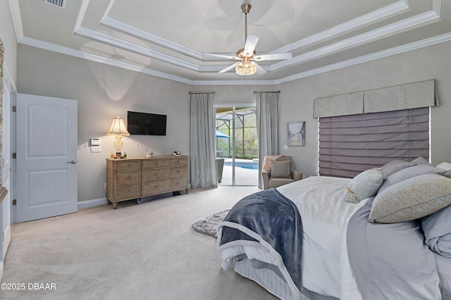 bedroom with a raised ceiling, ornamental molding, access to outside, and ceiling fan