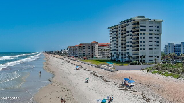 5499 S Atlantic Ave Unit 104, New Smyrna Beach, FL 32169 - property view of water featuring a view of the beach