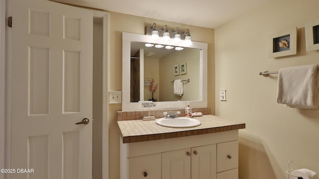 5499 S Atlantic Ave Unit 104, New Smyrna Beach, FL 32169 - bathroom featuring vanity