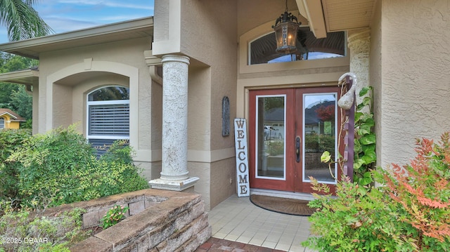 1929 Spruce Creek Lndg, Port Orange, FL 32128 - entrance to property with stucco siding and french doors