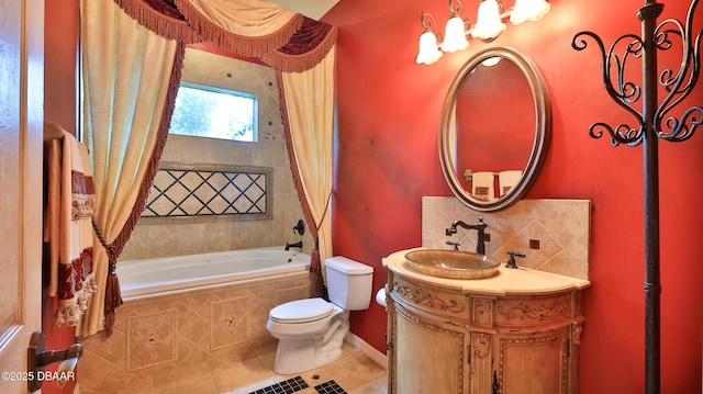 1929 Spruce Creek Lndg, Port Orange, FL 32128 - full bathroom with tile patterned floors, vanity, tiled shower / bath combo, and backsplash
